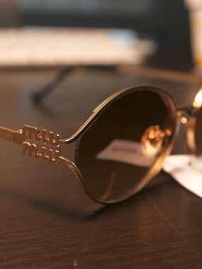 Miu Miu Gold Metal Round Sunglasses with Brown Lenses